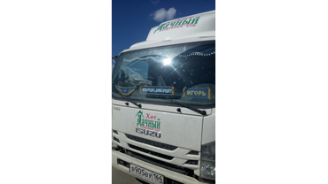 Ламбрекены ISUZU с помпонами, вымпела.