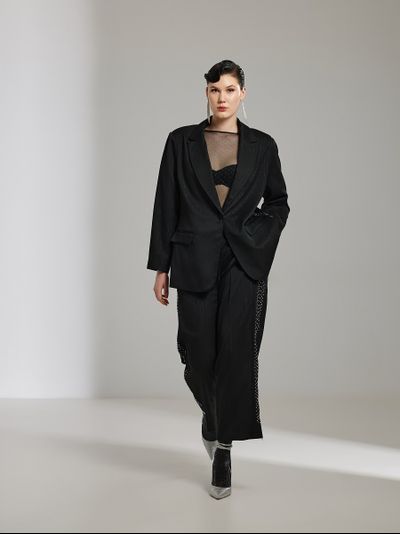 Женские нарядные брюки декорированные стразами