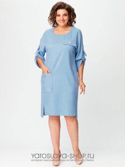 Нарядное женское платье голубого цвета в мелкую клетку