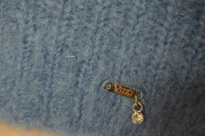 Vizio эмблема на шапке италии