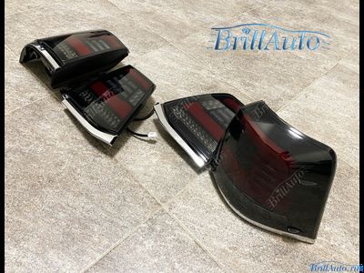 Cтопы Toyota Land Cruiser 200 07-15 LED темные БЕГАЮЩИЕ