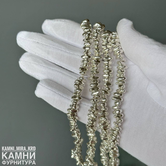 "Гематит" геметин камешки фри-форм 7-8х4-4,6 мм, цвет светлое серебро, цена за нить 19 см