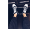 кеды Converse низкие черные на ногах