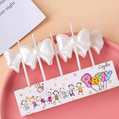 Свечи для торта "Бантик" (бел. перламутр), 5 шт./уп.