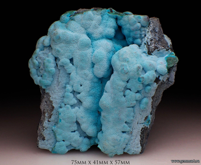 Хризаколла и прожилки малахита на породе. 75*41*57мм. Конго.