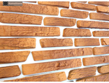 oblicovochnyy-kamen-pod-kirpich-kamastone-morskoy-briz-2522-oranzhevyy-s-krasno-korichnevym