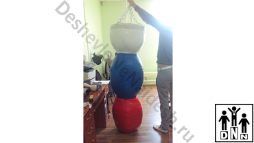 Тpёxceкциoнный боксерский мешок