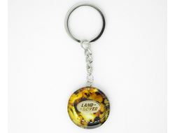 Брелок из натурального янтаря "Land Rover"