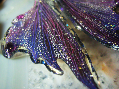 "Крылышки электрической феи ледяных молний", серьги с рубинами, родолитами и танзанитами