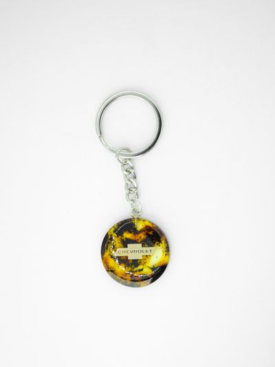 Брелок из натурального янтаря "Chevrolet"