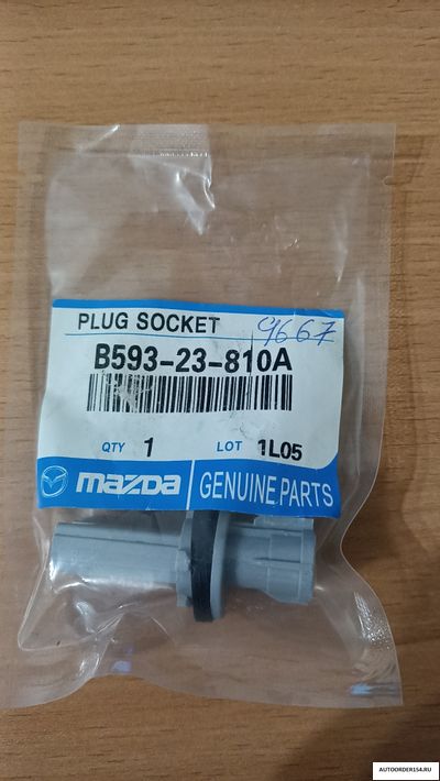 Патрон для габаритов Mazda (В593-23-810А) оригинал
