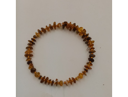 Браслет на пружине из янтаря,одинарный,безразмерный.