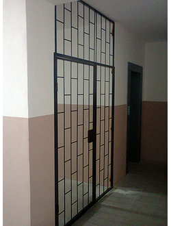 Металлические решетчатые тамбурные двери для технических и подъездных помещений