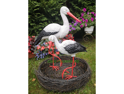 Аисты в гнезде 2шт.(Аист-70см, аист-80см ) полистоун Аист - является символом новой жизни. Согласно русским народным поверьям, аист - птица, приносящая счастье в Ваш дом. Также аист покровительствует рождению детей.