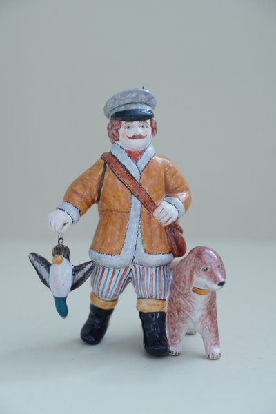 Охотник с собакой