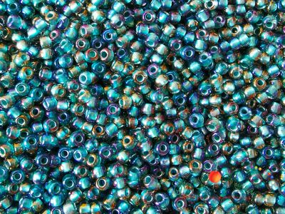 Toho 11/0 270 Inside-Color Crystal/Metallic Teal-Lined / Окрашенный изнутри хрусталь/ металлик капри