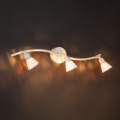 Настенный светильник с поворотным механизмом