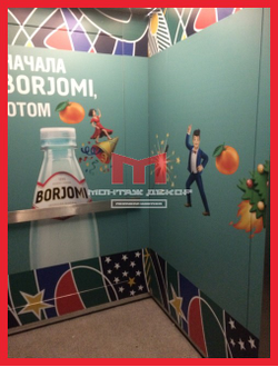 Брендирование лифтов в БЦ пленкой с полноцветной интерьерной печатью