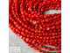 Коралл тонированный красный галтовка округлая фри-форм с раковенками и щербинками  5-8/7-10 мм, цена за нить 19 см