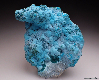 Хризаколла и прожилки малахита на породе. 66*52*16мм. Конго.