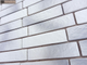 Декоративная облицовочная плитка под кирпич Kamastone Brick stile 11381-2, белый с серым микс