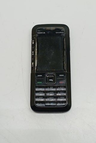 Неисправный телефон Nokia 5310 Xpress Music (нет АКБ, не включается)