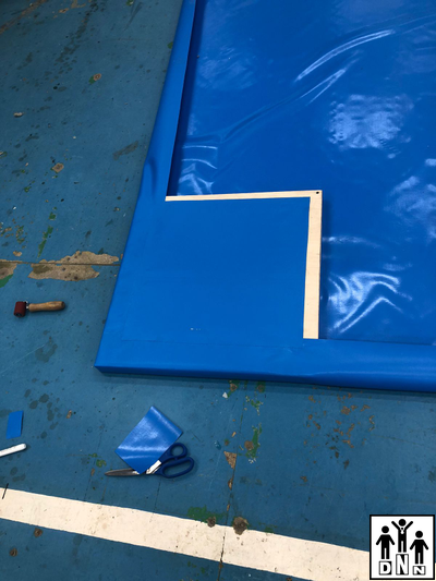 Покрышка борцовская 12х12м плотность 630гр*м2 двухцветная карманы DNN