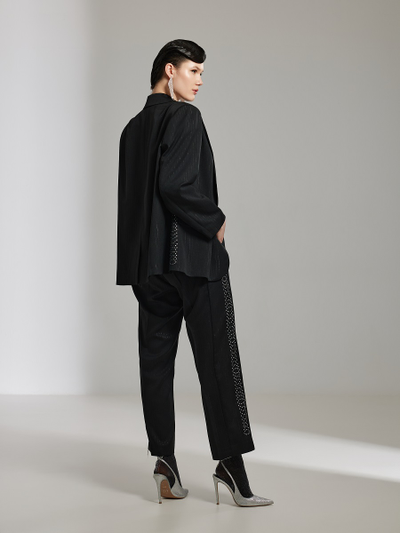 Женские нарядные брюки декорированные стразами