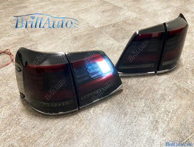 Cтопы Toyota Land Cruiser 200 07-15 LED темные БЕГАЮЩИЕ