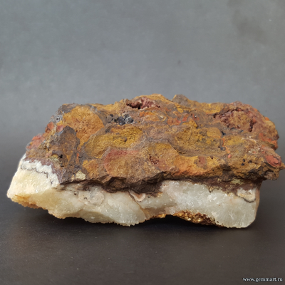 Кальцита на окисленной породе с пиритовой присыпкой и сидерит. Россия. 109*55*55мм