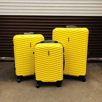 Пластиковый чемодан  Баолис желтый размер M