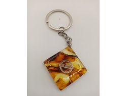 Брелок из натурального янтаря "Nissan"