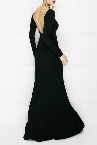 Элегантное длинное черное вечернее платье облегающего силуэта слегка расклешенное книзу с рукавами