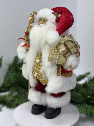 Дед Мороз в красном полушубке с подарками 30см