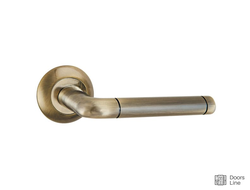 Дверная ручка PUNTO REX (зеленая бронза)