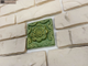Декор-изразец к плитке под кирпич Kamastone Сказка 3082, темно-зеленый с золотом
