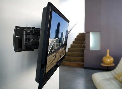 Заказать монтаж телевизора на стене спальни в квартире в Москве