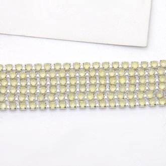 Стразовая лента. Светло-желтая лаковая 2 мм. Цапы под серебро (100 см)