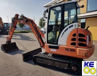 Стекло двери верхнее левое закаленное Terex TC35