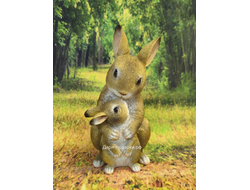 ЗАЙЧИХА С ЗАЙЧОНКОМ  22*15см   0,6кг   полистоун Россия 998//012804  Заяц считается символом жизни, плодородия и жизненной энергии