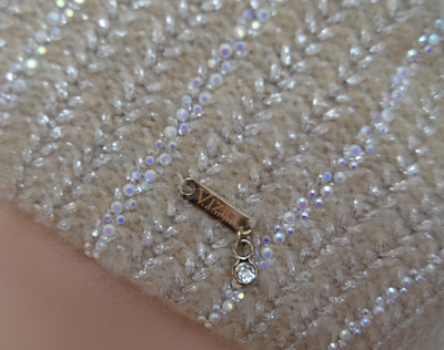 Украшения на вязаной шапке Италии Vizio фото