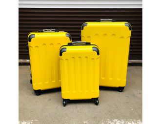 Комплект из 3х чемоданов ABS с накладками S,M,L желтый