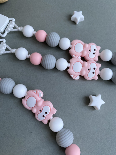 Держатель для пустышки "Розовый енот"