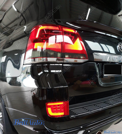 Cтопы Toyota Land Cruiser 200 07-15 в стиле 21 года LED (красные с темным низом)