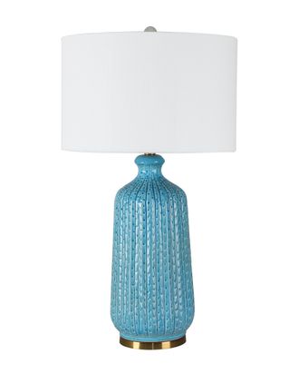 Настольная лампа с основанием из керамики бирюзового цвета.