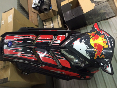 Наклейки на снегоход Polaris PRO RMK 2011-2014  RedBull красный фон (модификация 1)
