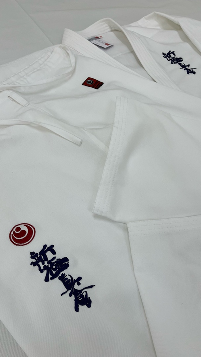 Детские доги (кимоно) отбеленные шинкиокушинкай