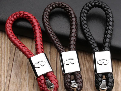 БРЕЛОК С КОЖАНЫМ ПЛЕТЁНЫМ РЕМЕШКОМ С ЛОГОТИПОМ АВТО