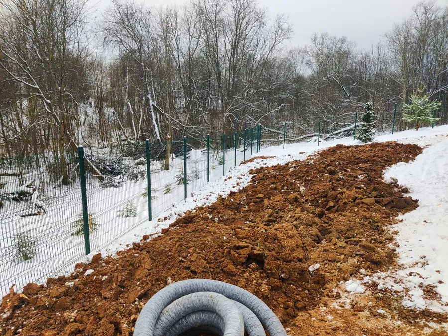 Вывоз грунта в овраг входил в дренажные работы