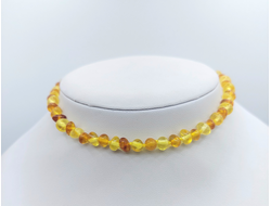 Детские бусы из обработанного янтаря через узелок арт.11